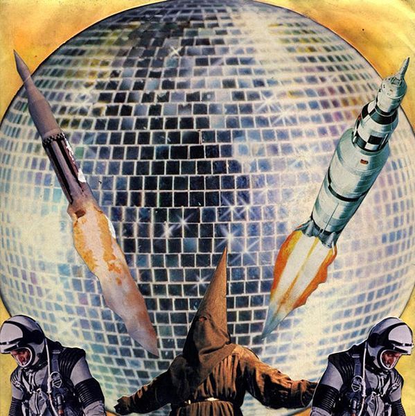 Album cover art for "Whachadoin?" by N.A.S.A. & Nick Zinner & Santigold & Spank Rock & M.I.A.