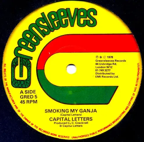 Album cover art for "Smoking My Ganja" by Capital Letters