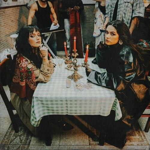 Album cover art for "Tento Na Língua" by Carolina Deslandes & IOLANDA
