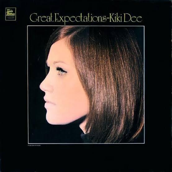Album cover art for "Love Makes The World Go ’Round" by Kiki Dee