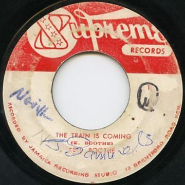 Album cover art for "The Train Is Coming" by Ken Boothe