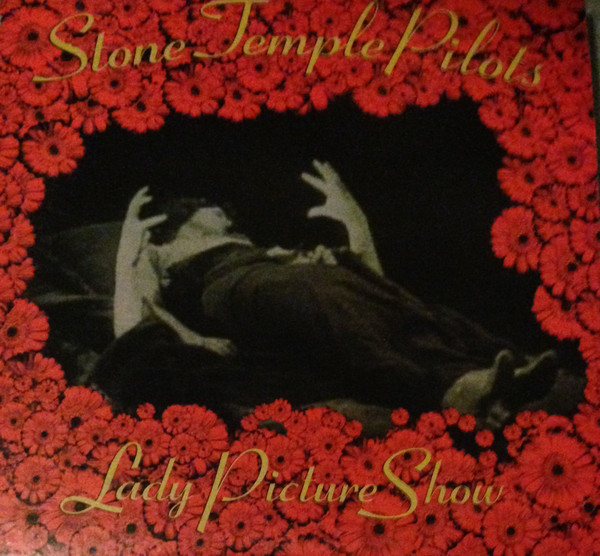 Album cover art for "Lady Picture Show" by Stone Temple Pilots