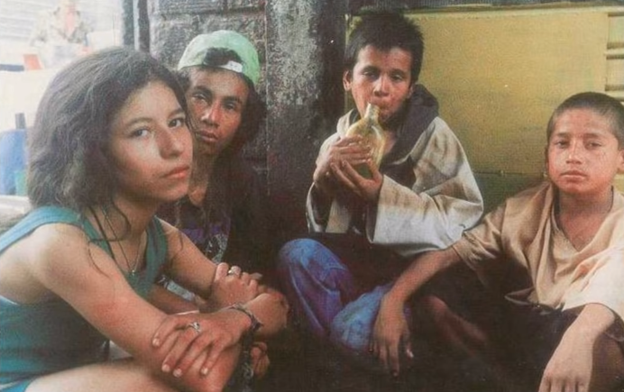 Album cover art for "La Vendedora de Rosas" by La Mafia del Amor