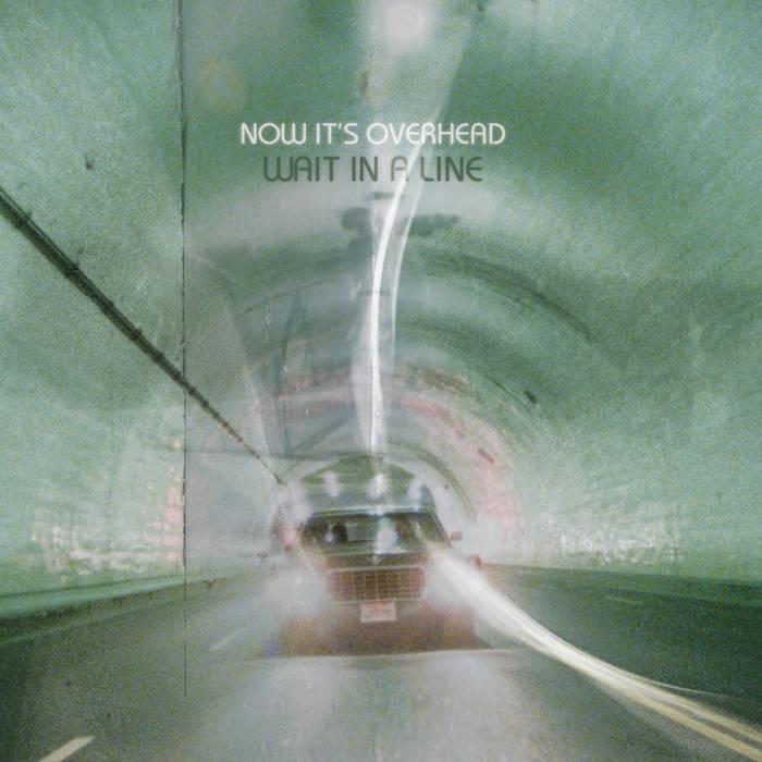 Album cover art for "Wait In A Line" by Now It’s Overhead