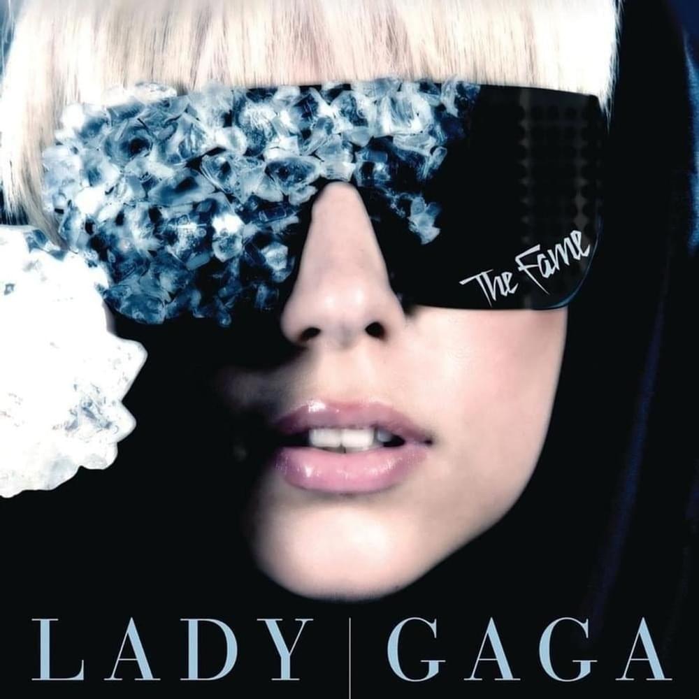 Album cover art for "Lady Gaga - Money Honey (Traducción al Español)" by Genius Traducciones al Español