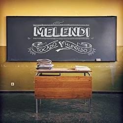 Album cover art for "Tocado y hundido" by Melendi