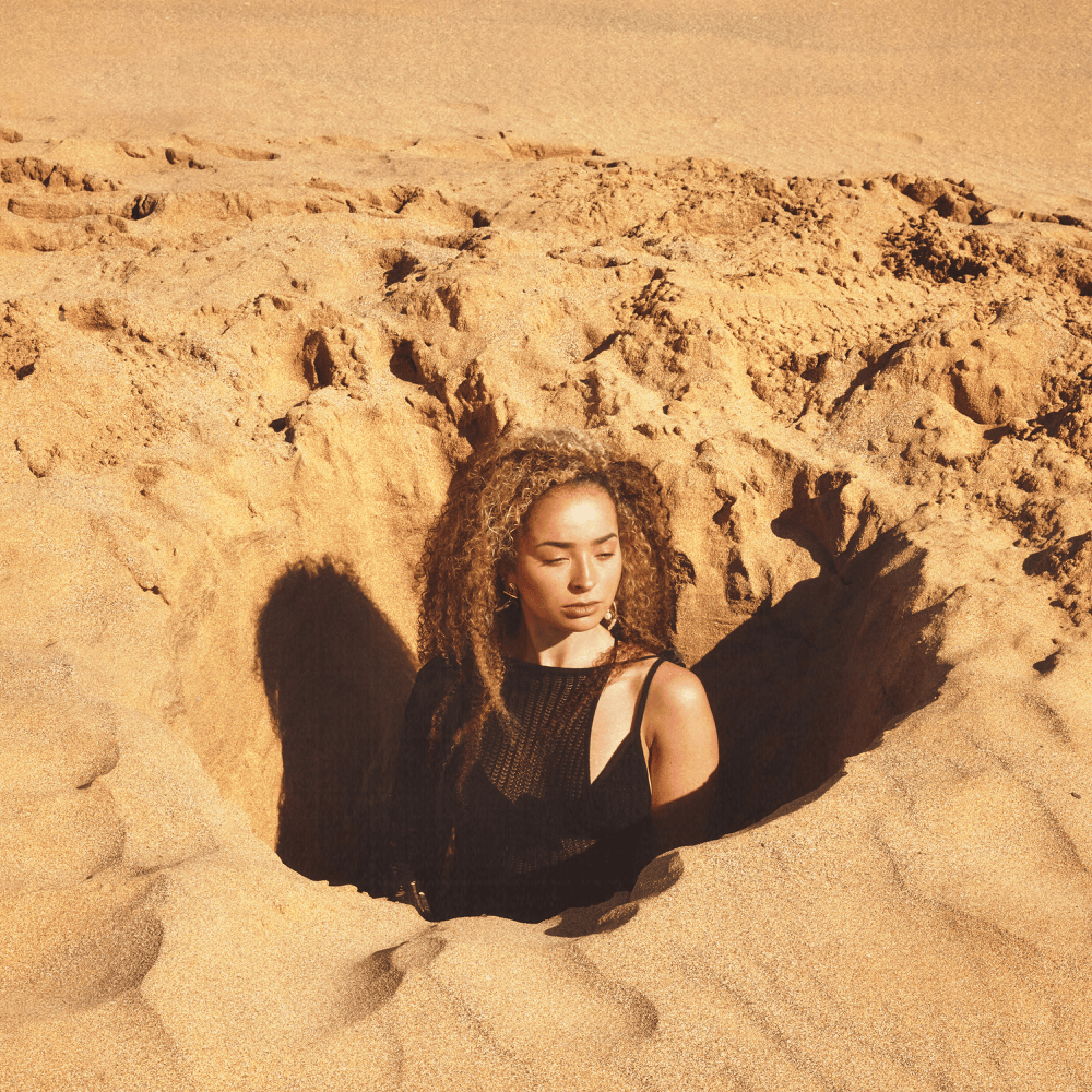 Album cover art for "head in the ground" by Ella Eyre