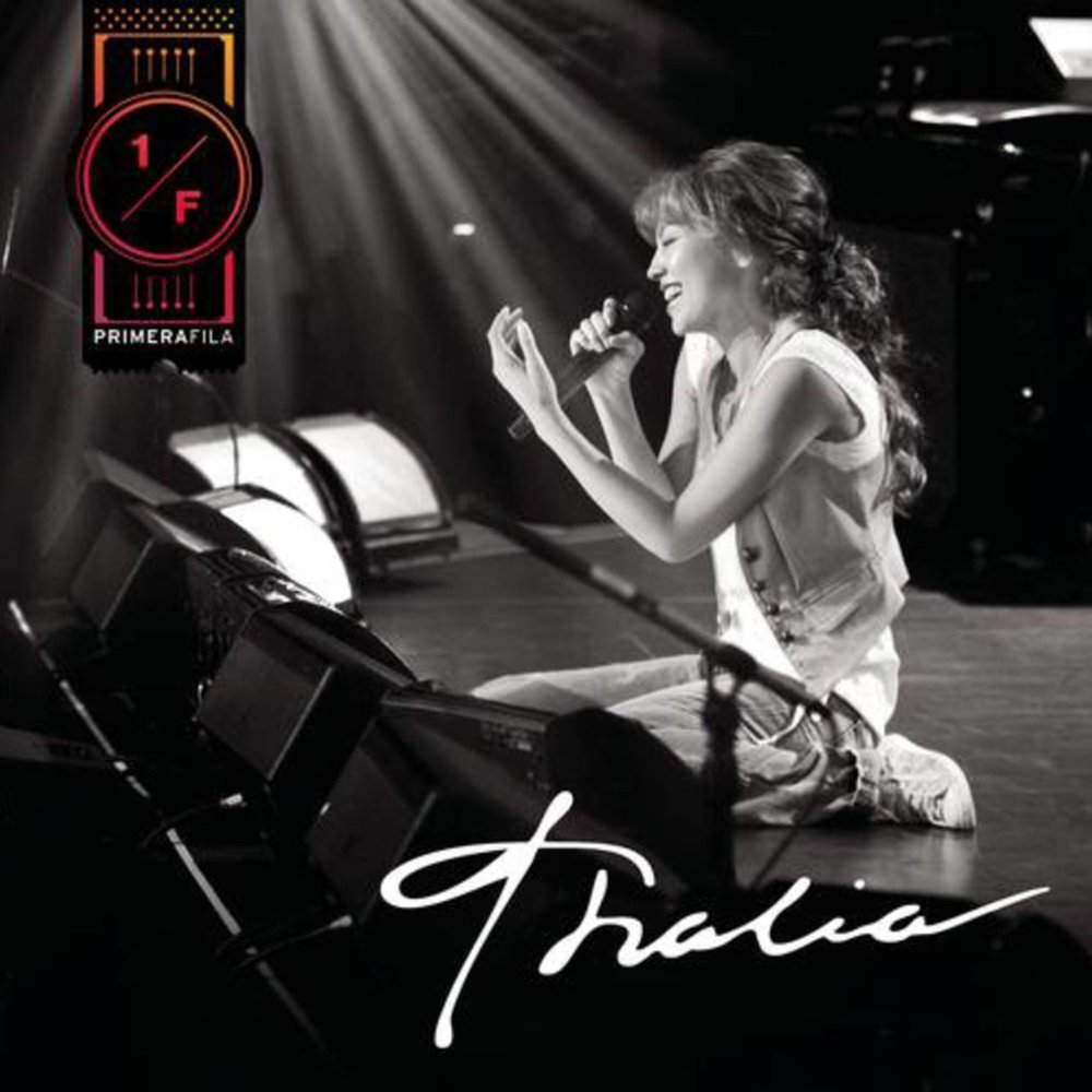 Album cover art for "Cuando Te Beso" by Thalía