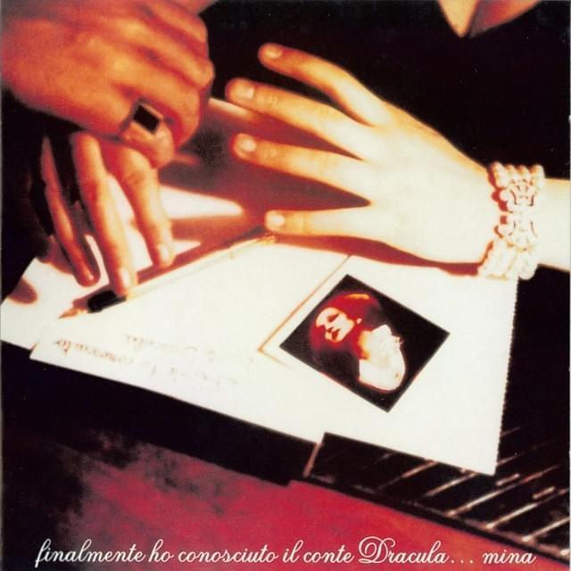 Album cover art for "Questione di feeling" by Mina & Riccardo Cocciante