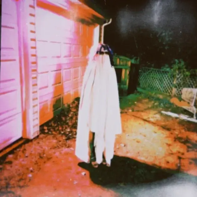 Album cover art for "CREEPING ME OUT" by Marisa Maino