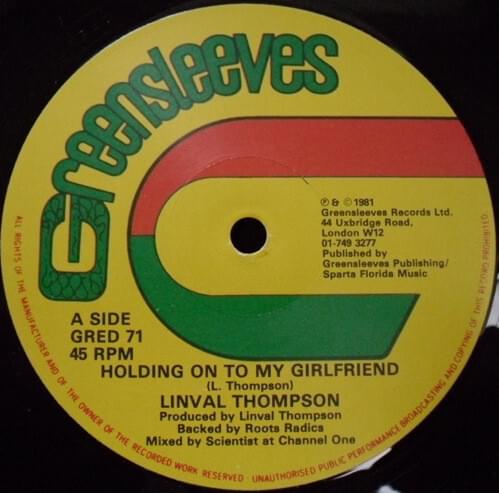 Album cover art for "Holding On To My Girlfriend (12" Mix)" by Linval Thompson
