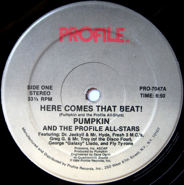 Album cover art for "Here Comes That Beat!" by Pumpkin And The Profile All-Stars & George “Galaxy” Llado & Fly Ty-rone & Mr. Troy & Fresh 3 MC’s & Dr. Jeckyll & Mr. Hyde & Greg G [US]