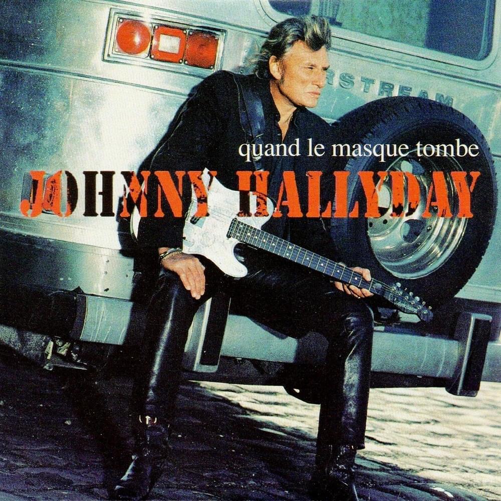 Album cover art for "Quand le masque tombe" by Johnny Hallyday