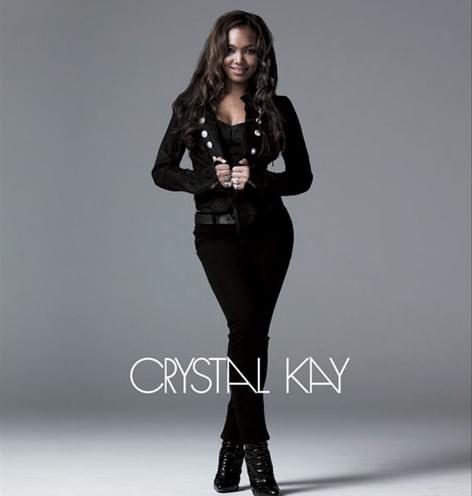 Album cover art for "こんなに近くで... (Konna ni Chikaku de)" by Crystal Kay