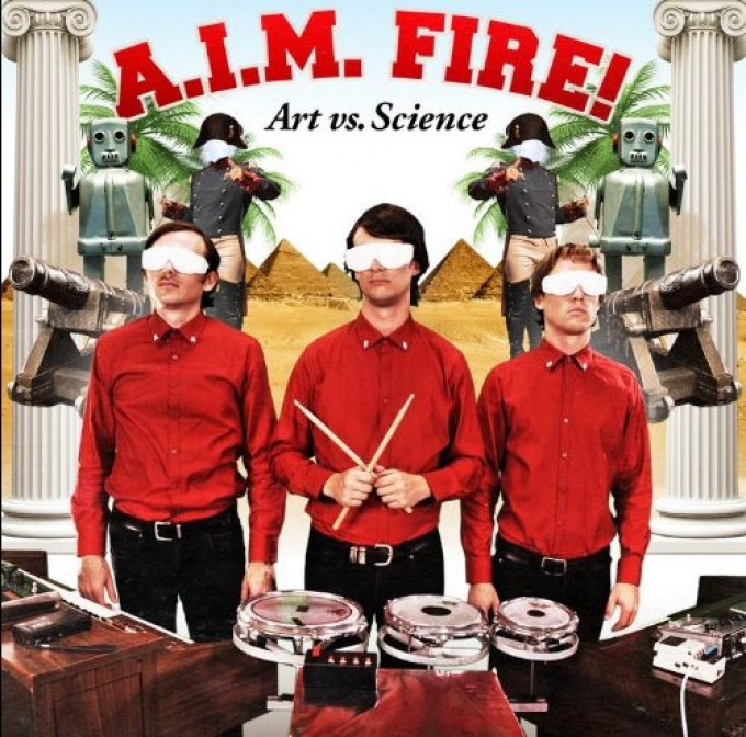 Album cover art for "A.I.M. Fire!" by triple j