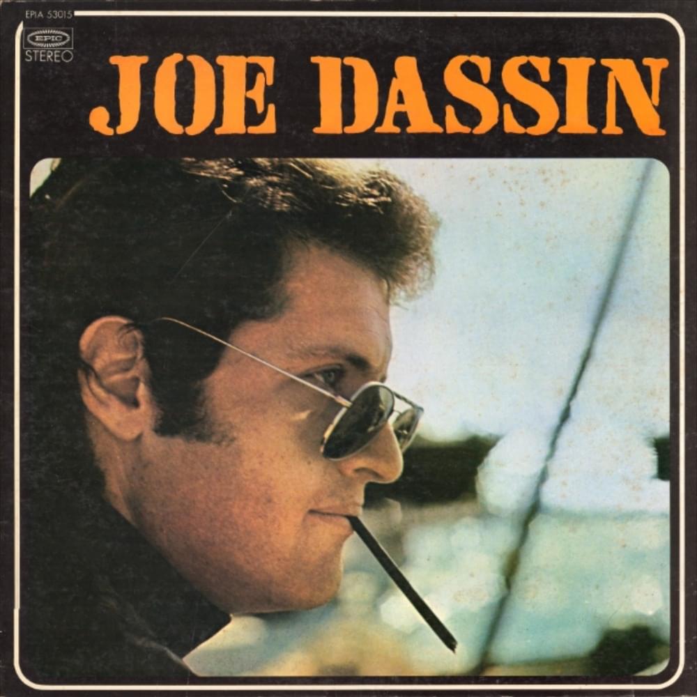 Album cover art for "Mon village du bout du monde" by Joe Dassin