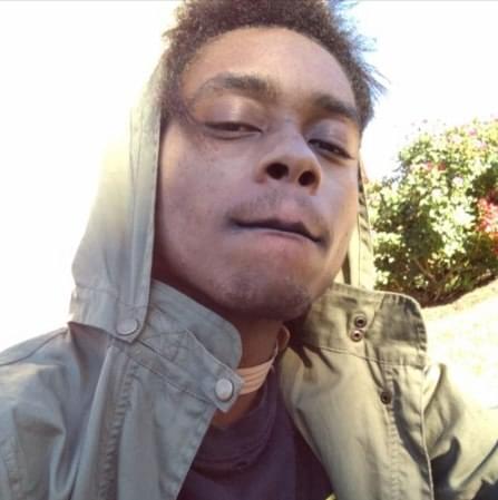 Album cover art for "JUS A NIGGA [AYE]" by Sybyr