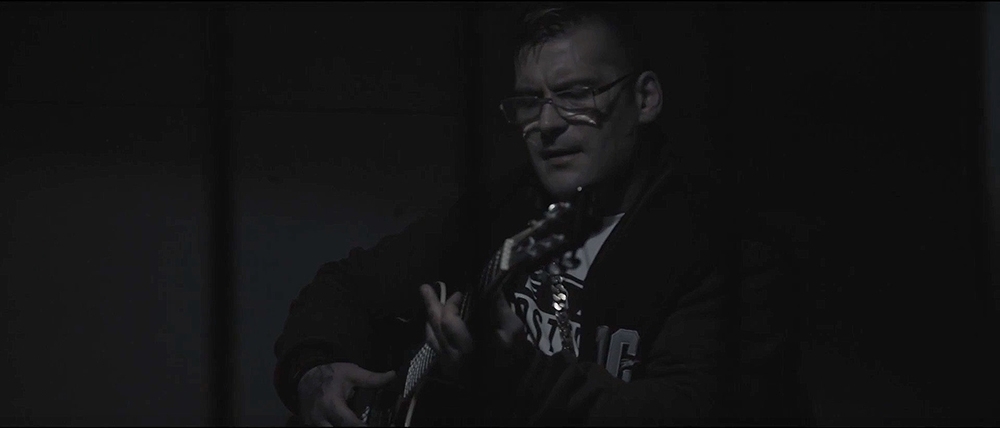 Album cover art for "Każdy z nas" by Popek