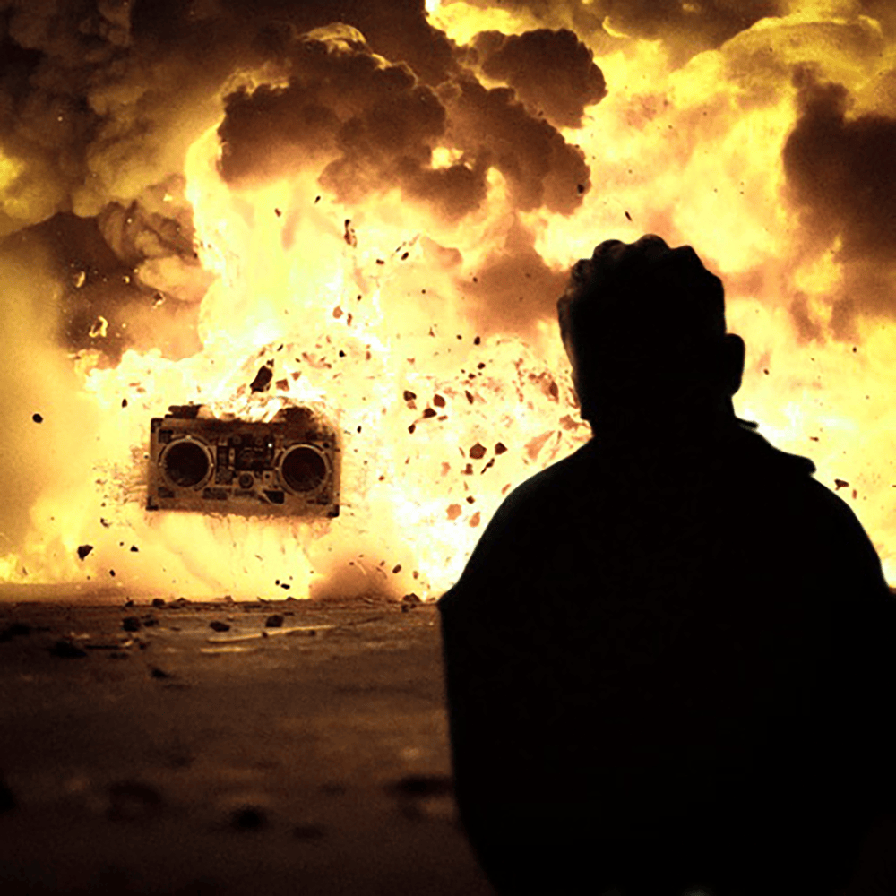 Album cover art for "THE ROOF IS ON FIRE" by Trueno