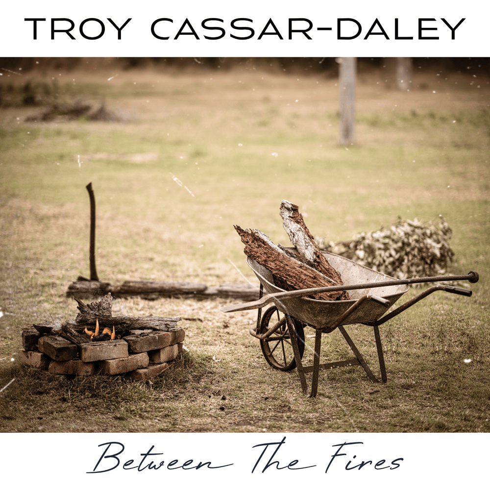 Album cover art for "Between the Fires" by Troy Cassar-Daley