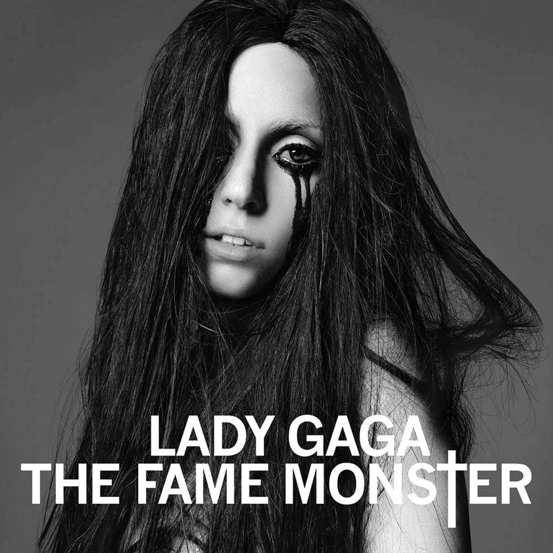 Album cover art for "Lady Gaga - Monster (Traducción al Español)" by Genius Traducciones al Español