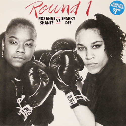 Album cover art for "Roxanne Shanté vs. Sparky D: Round One" by Roxanne Shanté & Sparky D