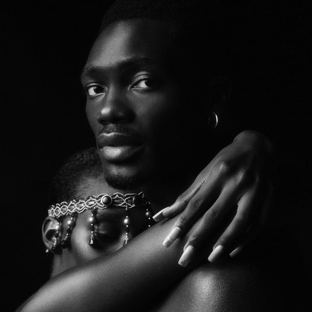 Album cover art for "She Loves Me" by TOBi