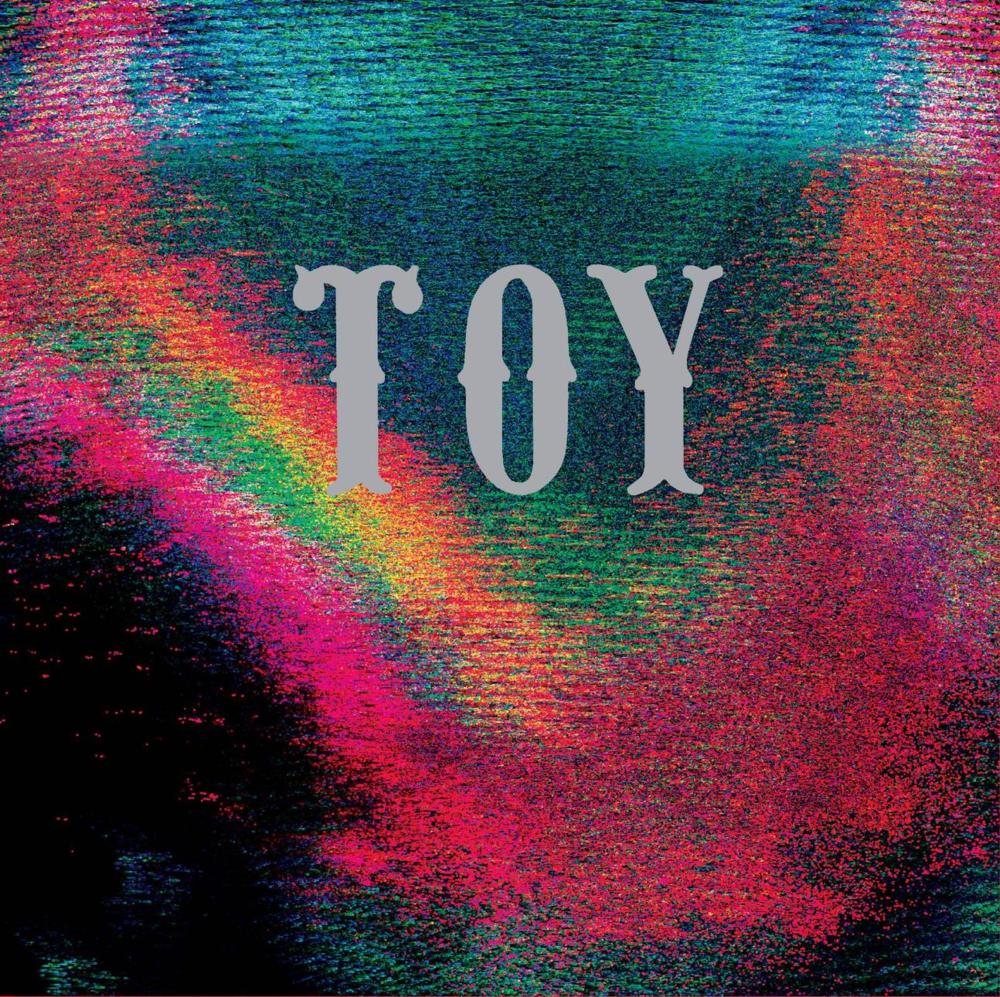Album cover art for "Motoring" by TOY