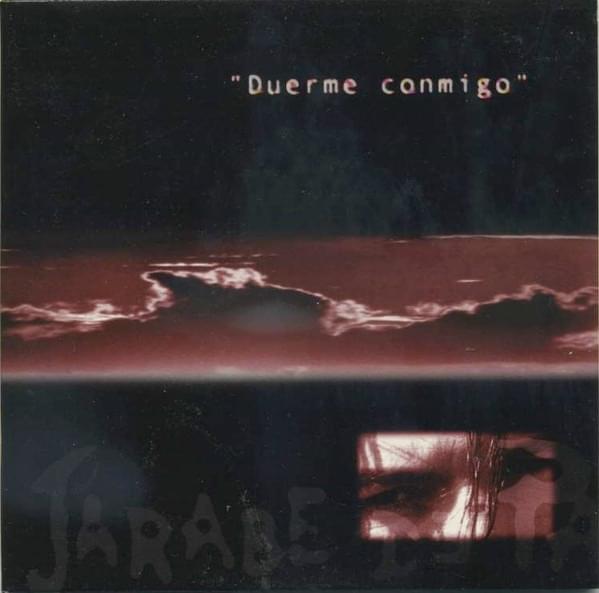 Album cover art for "Duerme Conmigo" by Jarabe de Palo