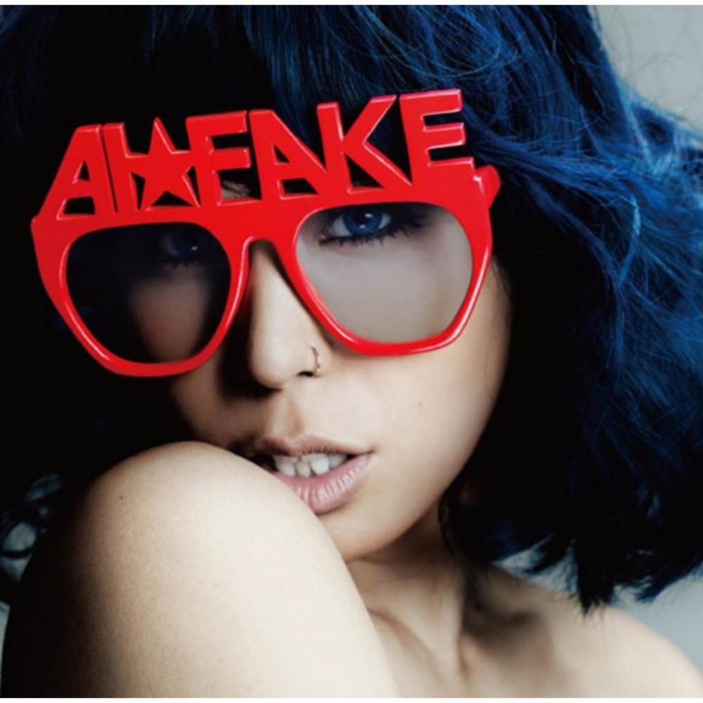 Album cover art for "FAKE" by AI (JPN) & 安室奈美恵 (Namie Amuro)