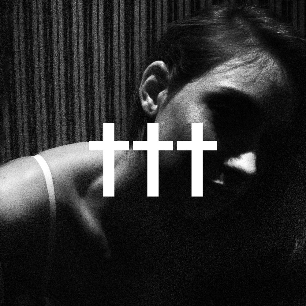 Album cover art for "Bitches Brew" by ††† (Crosses)