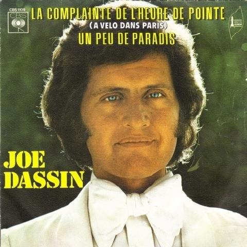 Album cover art for "Un peu de paradis" by Joe Dassin