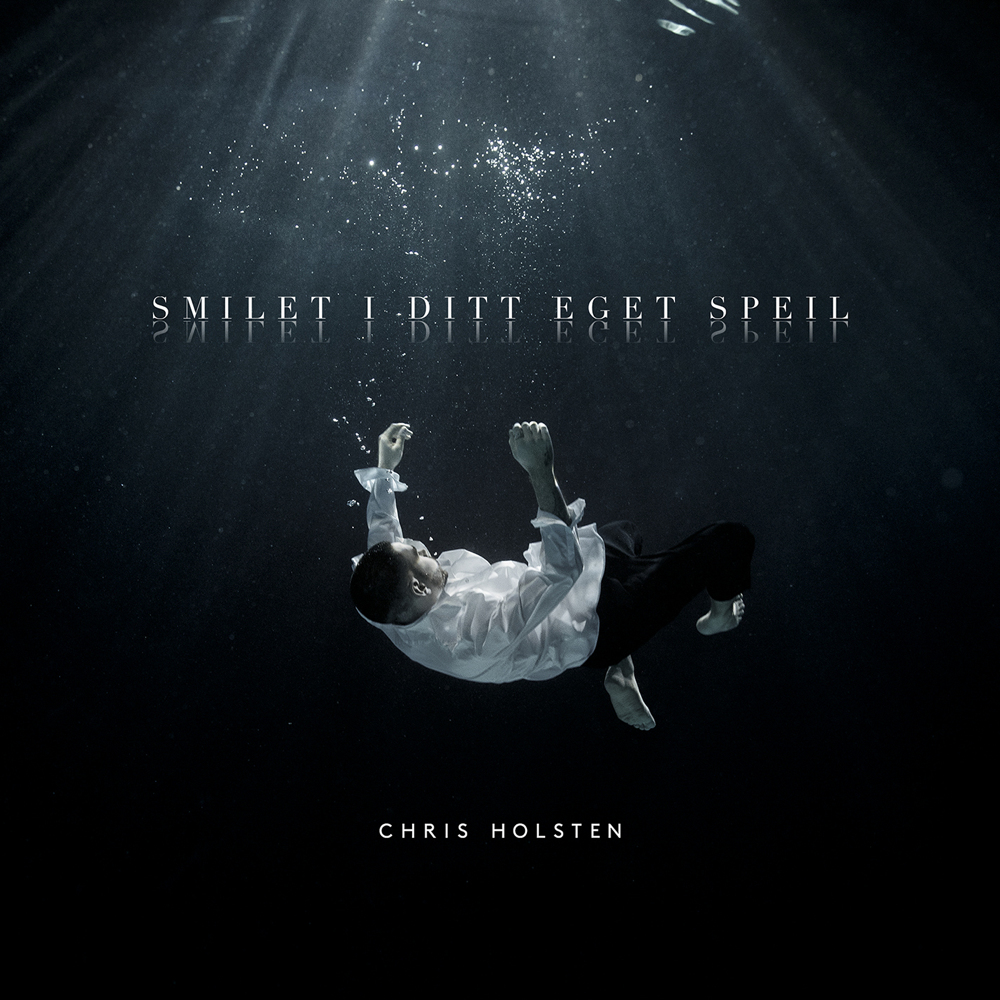 Smilet i ditt eget speil by Chris Holsten