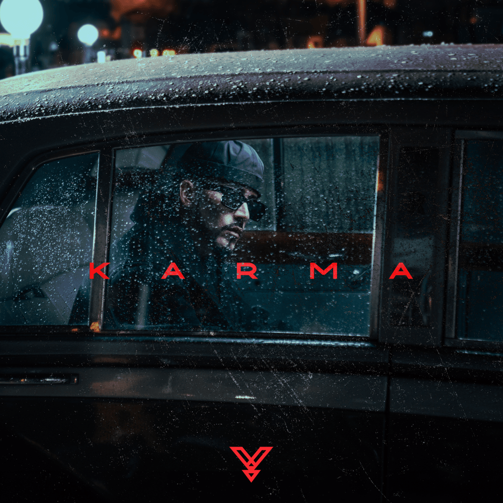 Album cover art for "KARMA" by Yandel
