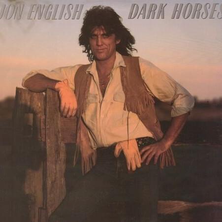 Album cover art for "Dark Horses" by Jon English