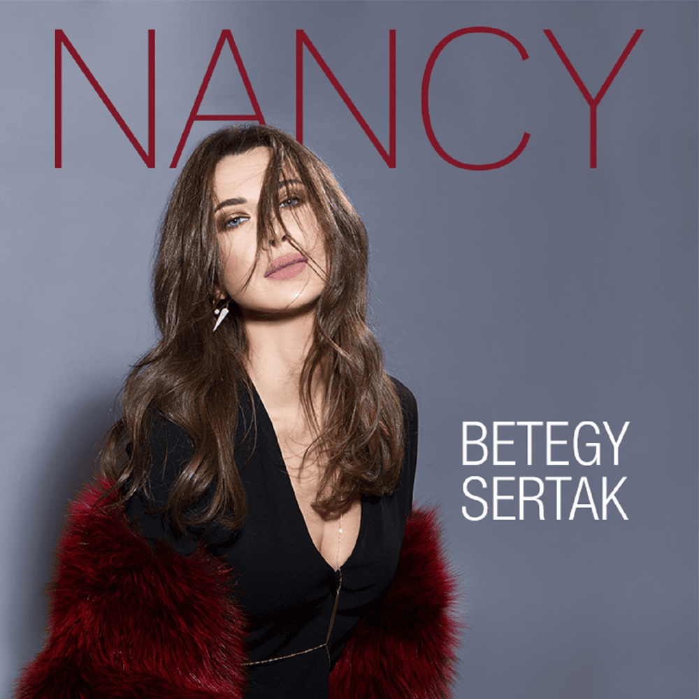 Album cover art for "Betegy Sertak - بتيجي سيرتك" by Nancy Ajram - نانسي عجرم