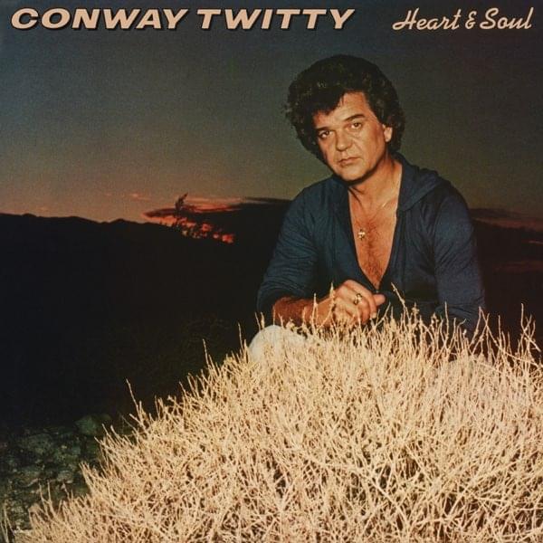 Album cover art for "She Thinks I Still Care" by Conway Twitty