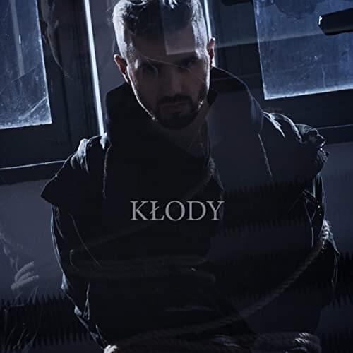 Album cover art for "KŁODY" by Emes Milligan