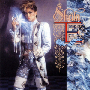 Album cover art for "Merci for the Speed of a Mad Clown in Summer" by Sheila E.