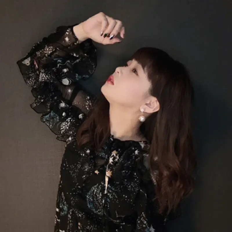Photo of 新垣里沙 (Risa Niigaki)