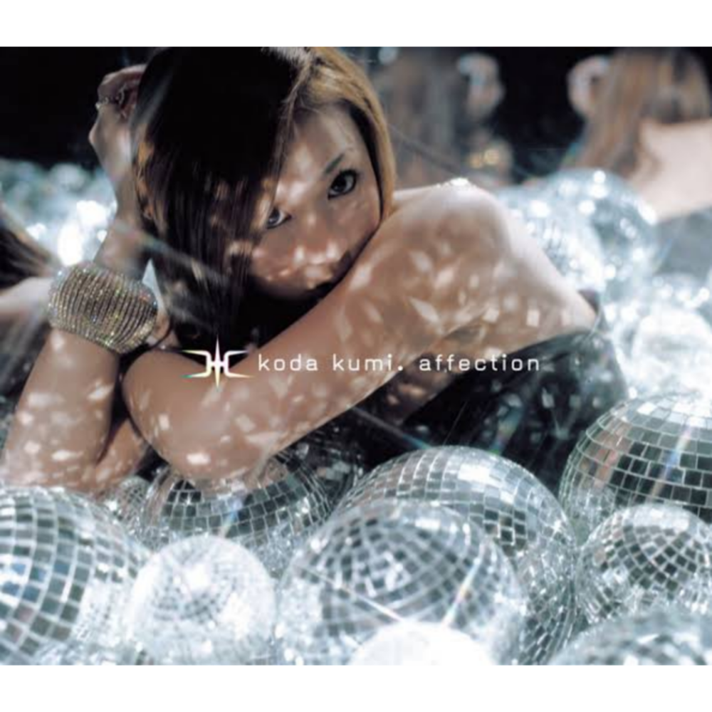 Album cover art for "come back" by 倖田來未 (Kumi Koda)