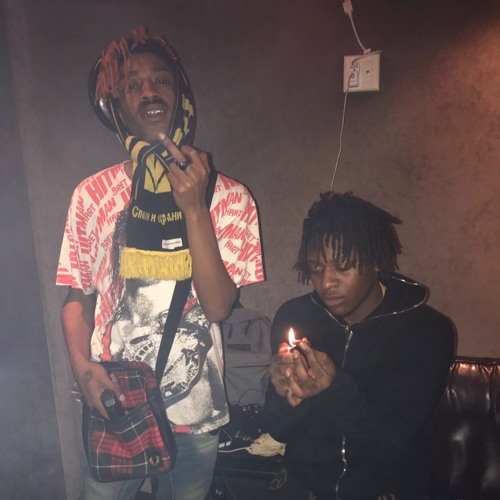 Album cover art for "RackAid" by Lil Tracy & UnoTheActivist