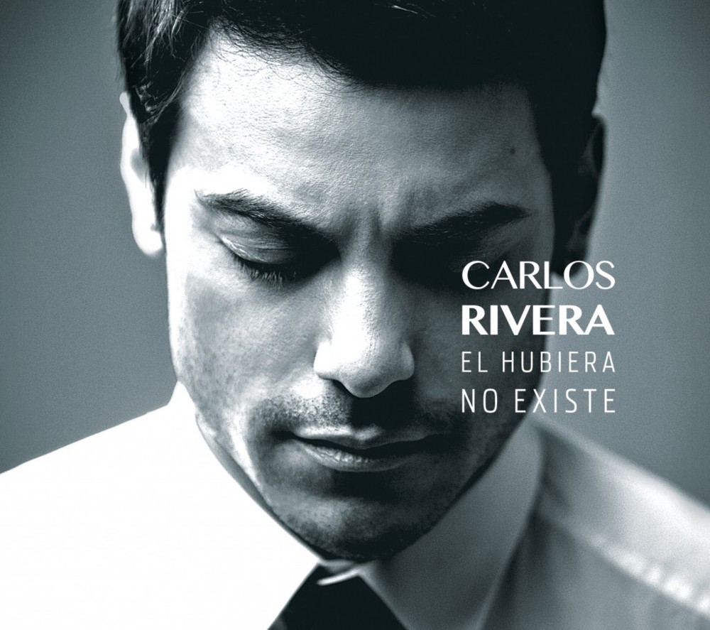 Album cover art for "Si Te Vas" by Carlos Rivera